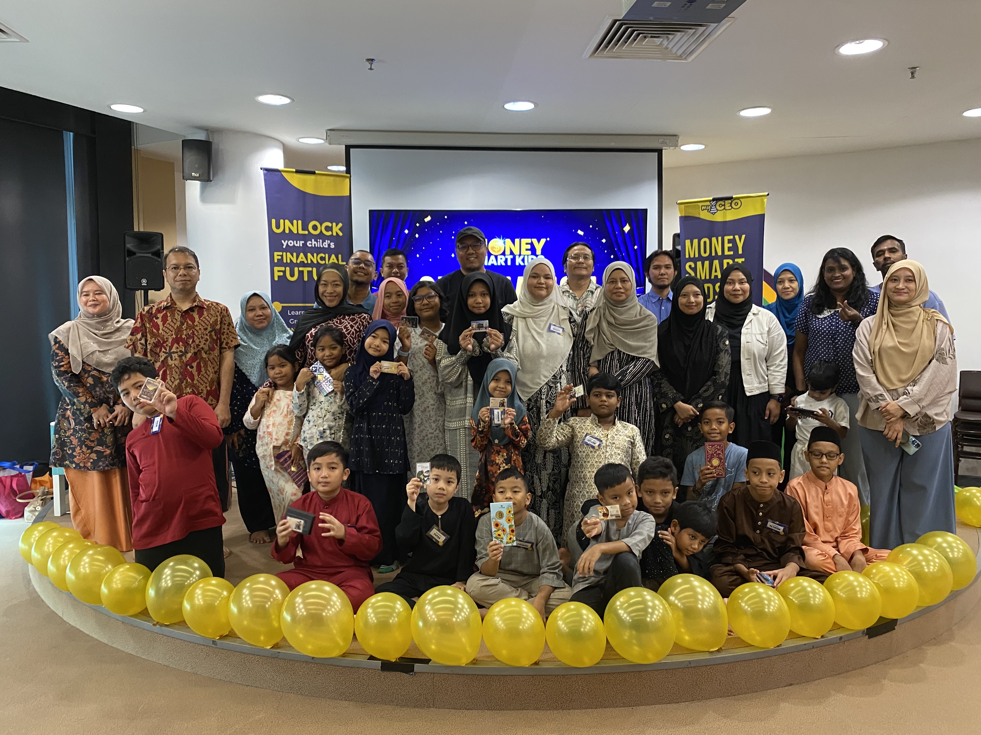 Children learning money skills, selling crafts and presenting ideas